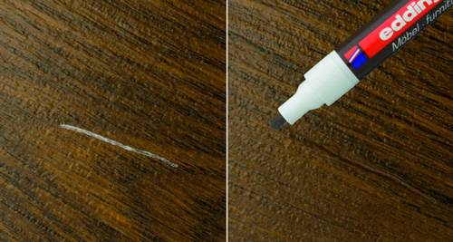 С помощью маркера для мебели можно закрасить царапины